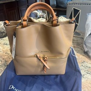 Dooney & Bourke new with tags.  Retail $415.  Storage bag included